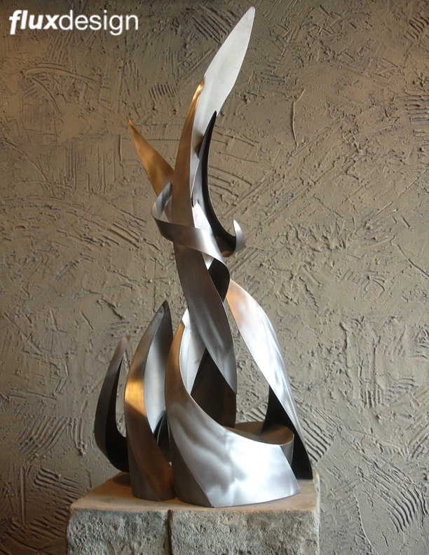 Flux Design,Kohls corporate sculpture maquette,steel flame sculpture,metal,Jesse Meyer,sculpture studio,Milwaukee wi