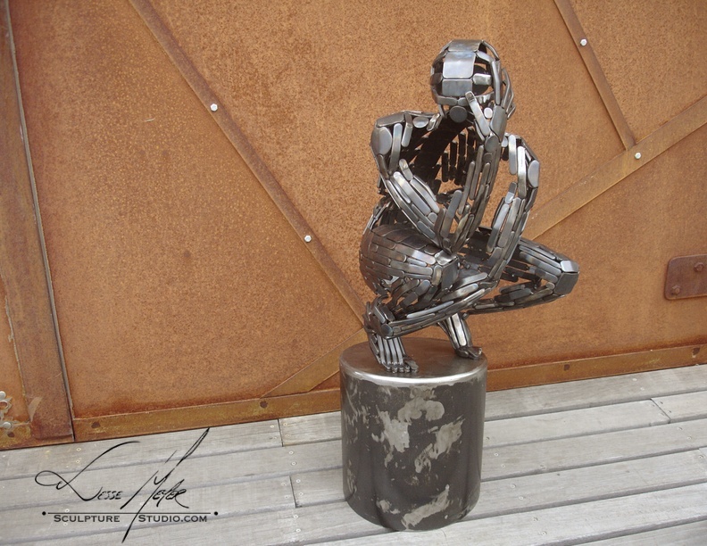 Internal Contemplation,art in Flux,steel figure sculpture,Jesse Meyer,sculpture studio,Milwaukee wi