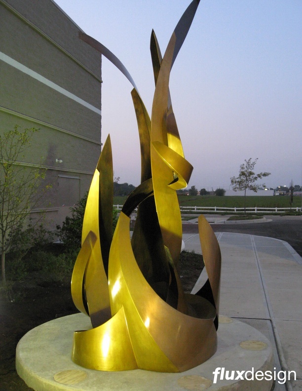 Flux Design,Kohls corporate sculpture,Large bronze flame sculpture,metal,Jesse Meyer,sculpture studio,Milwaukee wi